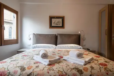 Letto o letti in una camera di In the heart of Florence