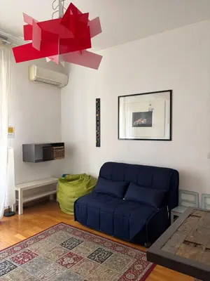 Area soggiorno di Cozy 1-BR Near Ponte Vecchio