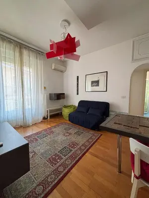 Area soggiorno di Cozy 1-BR Near Ponte Vecchio