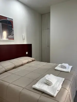 Letto o letti in una camera di Bella Ciao Firenze