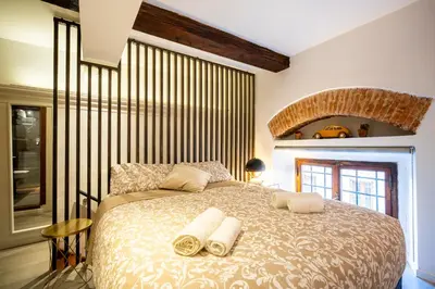 Letto o letti in una camera di Brancacci House - 500m da Ponte Vecchio by Hôtea