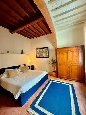 Letto o letti in una camera di Santo Spirito House & Suite