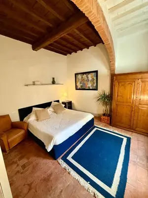 Letto o letti in una camera di Santo Spirito House & Suite