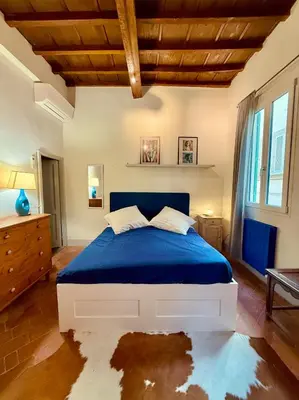 Letto o letti in una camera di Santo Spirito House & Suite