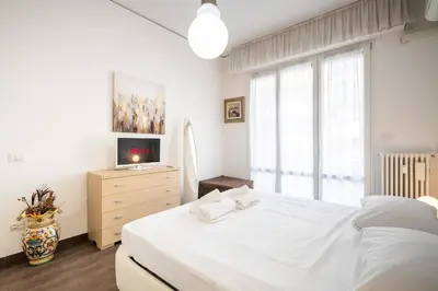 Letto o letti in una camera di Lungarno - Fuori ZTL - Parcheggio comodo in zona