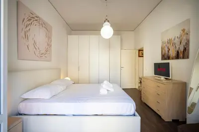 Letto o letti in una camera di Lungarno - Fuori ZTL - Parcheggio comodo in zona