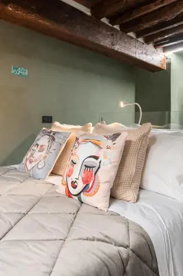 Letto o letti in una camera di Keys of Italy - Vigna Vecchia 24 - Cozy Mezzanine in Santa Croce