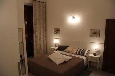 Letto o letti in una camera di Burchiello b&b