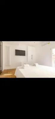 Letto o letti in una camera di Modern Camaldoli