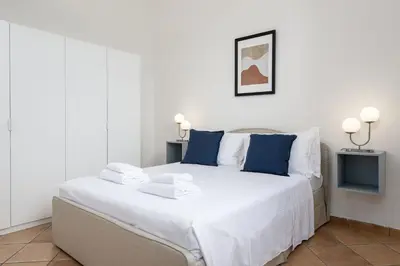 Letto o letti in una camera di UNYCA - Florence Central Market Apartment 2