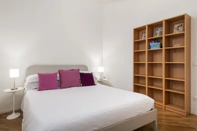 Letto o letti in una camera di UNYCA - Ponte Vecchio Florence Apartment