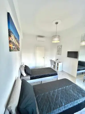 Letto o letti in una camera di Appartamento Cuore Di Firenze