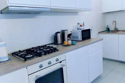 Cucina o angolo cottura di Snuggly Blue Home
