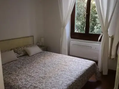 Letto o letti in una camera di La Casina di San Frediano