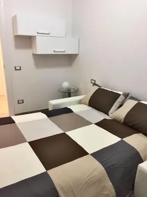 Letto o letti in una camera di Tommy House San Frediano