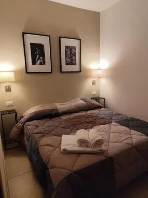 Letto o letti in una camera di Sweet Home Pilastri