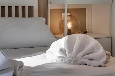 Letto o letti in una camera di Sacha Apartment by Mamo Florence