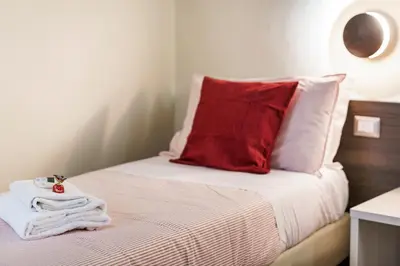 Letto o letti in una camera di Repubblica Suites By San Firenze Collection