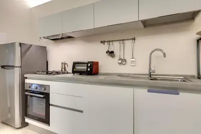 Cucina o angolo cottura di Orto Apartment by Mamo Florence