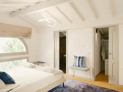 Letto o letti in una camera di Gaucha - Stylish and modern nest beside Arno