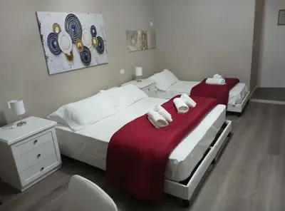 Letto o letti in una camera di San Gallo Guesthouse