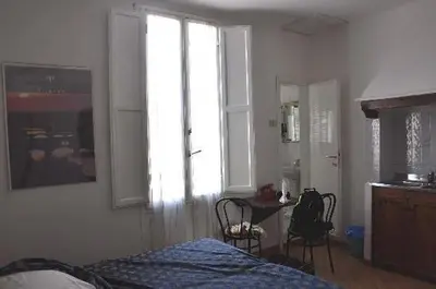 Letto o letti in una camera di San Gallo Guesthouse