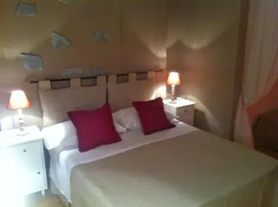 Letto o letti in una camera di San Gallo Guesthouse