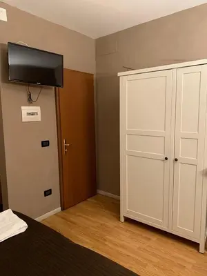 Letto o letti in una camera di San Gallo Guesthouse