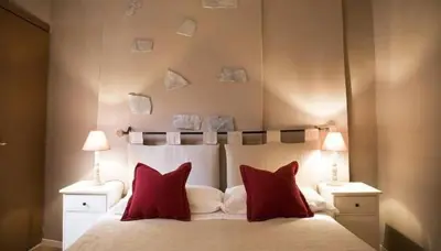 Letto o letti in una camera di San Gallo Guesthouse