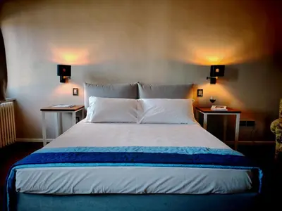 Letto o letti in una camera di Artiminus Don Baldino