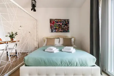Letto o letti in una camera di Senese Apartment By San Firenze Collection
