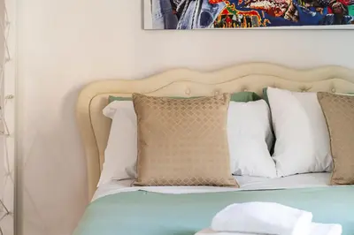 Letto o letti in una camera di Senese Apartment By San Firenze Collection