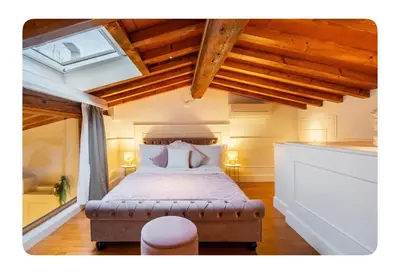 Letto o letti in una camera di The bright window in Florence! Super centrale!