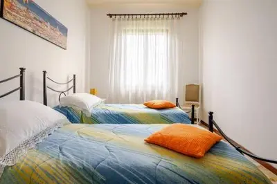 Letto o letti in una camera di Appartamento il vecchio Forno