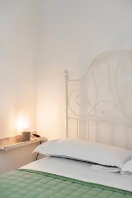 Letto o letti in una camera di Mosse House By San Firenze Collection