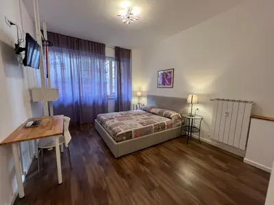 Letto o letti in una camera di Pure Living by Tinti