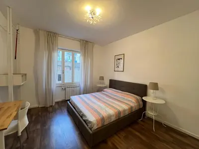 Letto o letti in una camera di Pure Living by Tinti