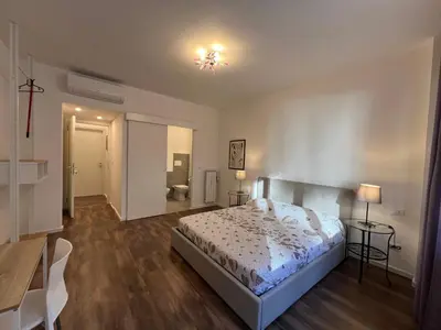 Letto o letti in una camera di Pure Living by Tinti