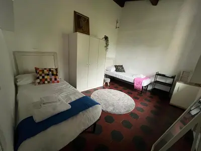 Letto o letti in una camera di Romana 4 Bedrooms with Garden
