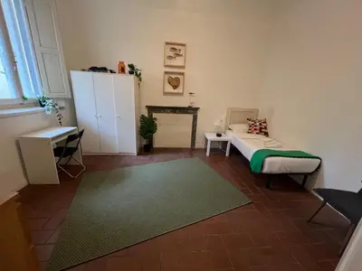 Cucina o angolo cottura di Romana 4 Bedrooms with Garden