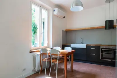 Cucina o angolo cottura di Romana 4 Bedrooms with Garden