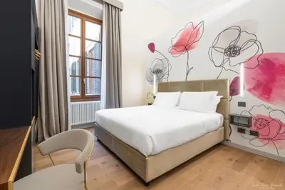 Letto o letti in una camera di Hotel Adamas