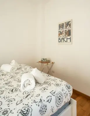 Letto o letti in una camera di Crystal house FRONT TRAMVIA
