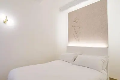 Letto o letti in una camera di Luxury Suite - 5 minutes walk from the Duomo