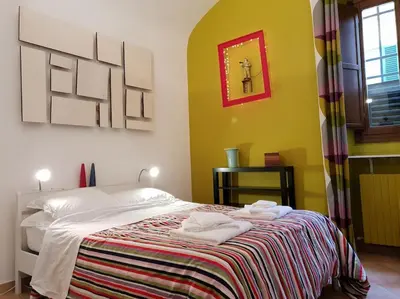 Letto o letti in una camera di Charming Garden in Florence