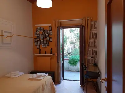 Letto o letti in una camera di Charming Garden in Florence