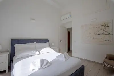 Letto o letti in una camera di Freedom Florence Apartment