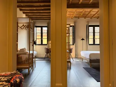 Letto o letti in una camera di Palazzo Santa Monaca