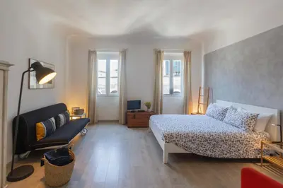 Letto o letti in una camera di Piazza del Mercato Centrale