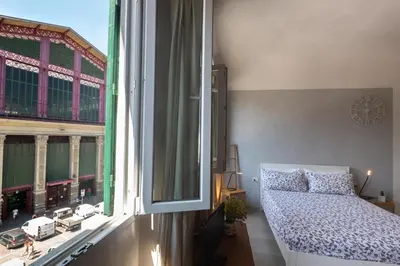 Letto o letti in una camera di Piazza del Mercato Centrale